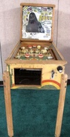 Image # 40348: Gold Mine Cabinet - Front View 
(The backglass is present but has so much paint peeling that very little artwork is left. Serial number 1729.)