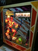 Image # 65298: Golden Arrow Sample Game - Illuminated Backglass 
(The red areas of this backglass have faded to white. Serial number 01002S.)