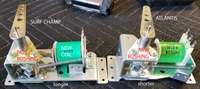 Image # 70782: Atlantis Flipper Mechanism Comparison - Annotated 
(A sample Atlantis game used shorter flipper mechanisms than the production games. Shown here is a mechanism from a Surf Champ game which is the same mechanism used on Atlantis production games. The replacement coil and bushing are immaterial to this comparison.)