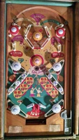 Image # 71963: Golden Gloves Playfield 
(The flippers and all eight daisy caps are not original to this game. See Image #1032 in this listing for this same playfield but with the original caps.)