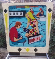 Image # 38030: Grande Domino Backglass with Modified Score Reels 
(Comparing this backglass to the flyer, the placement of the 4 score reels against a larger black background suggest that this game had been previously modified to 5-digit scoring, as was common in Italy, and then was changed back to 4-digit scoring, minus the comma.)