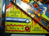 Image # 33422: Guns N' Roses Left Apron Sticker 
(Game has serial number 113655 dated Aug 9, 1994.)