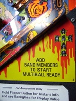 Image # 33424: Guns N' Roses Right Apron Sticker 
(Game has serial number 113655 dated Aug 9, 1994.)