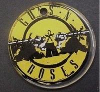 Image # 60595: Guns N' Roses Promotional Plastic 
(The estimated size of this plastic is that of a USA half dollar.)