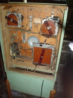 Image # 48678: Happy-Go-Lucky Inside Backbox 
(A small bell and its solenoid are missing from the bracket in the top center area of the insert. Serial number 52566HL.)