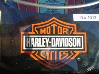 Image # 31823: Harley-Davidson (1st production run) Card Holder - Detail 
(Serial number I656432. The paper sticker with No. 1013 is an Australian serial number.)