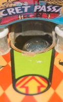 Image # 59175: Haunted House Ball in Secret Passage 
(The hinged standup target has been pushed down by the force of the ball. The ball then rolls off of it, allowing it to return to its upright position. For this picture, the ball is prevented from rolling down.)