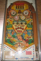 Image # 31923: Hawaiian Isle Playfield - Pleasure Isle 
(A mini-post located between and below the flippers in this example was likely added by an operator who also moved the outlane mini-posts from their original positions. Operators in Italy were known for substituting the flattop pop bumper caps in place of the starburst ones.)