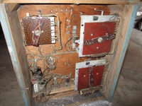 Image # 58210: Hit 'N' Run Inside Backbox 
(Two bells are missing from the center third of this backbox. The coils and their brackets remain.)