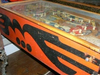 Image # 46876: Baby Face Cabinet - Left 
(The style of flipper shown here is not original to this game.)