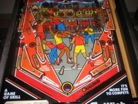 Image # 38900: Hoops Lower Playfield 
(The red and blue rubber post sleeves are not original to this game. Factory sleeves are black.)