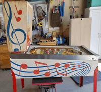 Image # 83732: Hootenanny Cabinet - Left 
(The factory mushroom bumper was replaced on this game with a rollover button. The legs and lockdown bar end caps have been repainted. Serial number H 1759.)