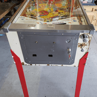 Image # 83734: Hootenanny Cabinet - Front 
(The factory mushroom bumper was replaced on this game with a rollover button. The legs, lockdown bar end caps, and coin door have been repainted. Serial number H 1759.)