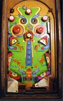 Image # 7337: Horse Shoes Playfield 
(The top three bumpers caps are incorrect for this game. The flippers are missing from this playfield.)