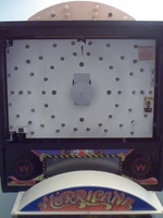 Image # 42047: Hurricane Behind Backglass 
(The backglass, the round rotating translite, and the topper cover have all been removed to show bulb locations.)