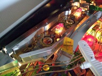 Image # 62207: Indiana Jones: The Pinball Adventure Early Production - Mini-Playfield 
(The mini-playfield side rails are stainless steel instead of red plastic used on production games. The prototype serial number on this game was sanded/repainted by a previous owner and could not be read.)