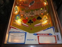 Image # 57137: Joker Illuminated Lower Playfield 
(The post between the flippers is not original to this game.)