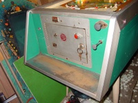 Image # 19980: Jungle Cabinet - Front 
(The cabinet shown here has been repainted a solid green but is included to show its other features. The red button directly above the key lock is not original to this game. Pressing it starts play. Its necessity is unclear: the factory-installed start button is to the left of the coin door.)