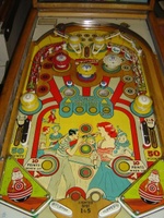 Image # 23898: Kewpie Doll Playfield 
(The two passive bumpers at the top have their rubber rings positioned differently than in the game flyer.)