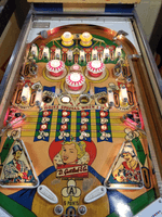 Image # 78164: Kings & Queens Illuminated Playfield 
(The brass liners in the kick-out holes are not original to this game.)