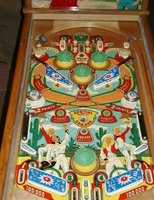Image # 23814: Lazy-Q Playfield 
(The flyer indicates that the bumpers caps and flippers are gold. The only gold parts evident on the game pictured here are two bumper caps.)
