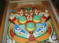 Image # 23815: Lazy-Q Upper Playfield 
(The flyer indicates that the bumpers caps and flippers are gold. The only gold parts evident on the game pictured here are two bumper caps.)