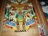 Image # 23817: Lazy-Q Lower Playfield 
(The flyer indicates that the bumpers caps and flippers are gold. The only gold parts evident on the game pictured here are two bumper caps.)