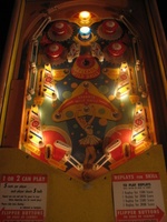 Image # 29184: Balls-A-Poppin Slingshot Kickers Lit 
(Hitting the blue bumper lites the slingshot kickers for increased value and turns off the pop bumper lights and the lights under the apron. Serial number B1710.)
