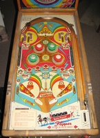 Image # 69444: Lightning Ball Playfield 
(The visible portions of the gobble hole troughs have been encased by the owner to prevent viewing inside the machine. Serial number M18463.)