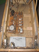 Image # 69462: Lightning Ball Inside Cabinet 
(The 'extra chute' relay was not installed by the factory. The unterminated wires for it are covered by a piece of dark paper stapled to the motor board. Serial number M18463.)