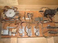 Image # 69464: Lightning Ball Inside Cabinet - Middle 
(The 'extra chute' relay was not installed by the factory. The unterminated wires for it are covered by a piece of dark paper stapled to the motor board. Serial number M18463.)