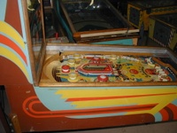 Image # 44170: Lulu Cabinet - Left 
(The '1' insert above the left flipper is not original to this game. The paper apron at playfield bottom is a reproduction.)