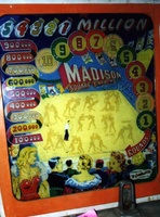 Image # 6179: Madison Square Gardens Backglass Showing Animation Images 
(The wedgehead cabinet in this image is not original to this game.)