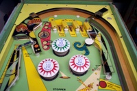 Image # 18032: Bally Hoo Upper German Playfield 
(The bumper caps on this game are incorrect. The original caps had no printing on them.)