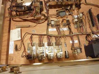Image # 67436: Majorettes Sample Game - Motor Board - Detail 
(Metal parts have been cleaned and polished. The white rectangular labels are reproduction. Serial number 01006 S.)