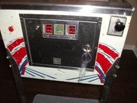 Image # 45039: Mars Trek Cabinet - Front 
(This image shows the serial number stamped in the wood below the coin door.)