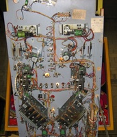 Image # 27823: Mata Hari Under Playfield 
(This game has several serial numbers:1110 is stamped externally on both the cabinet side and head.1112 is tagged on the inside cabinet motor board.1113 is tagged inside the backbox.1116 is tagged under the playfield.)