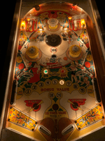 Image # 77198: Merry-Go-Round Illuminated Playfield 
(All parts are original except the flipper bats.)