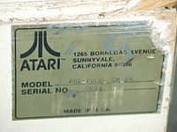 Image # 15069: Middle Earth Pre-Production Model Number 
(This game has a white cabinet and has this aluminum plate affixed to the back.)