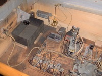 Image # 45792: Minstrel Man Inside Cabinet 
(The brass plumb-bob tilt mechanism is original to this game.)