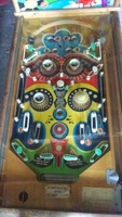 Image # 61251: Band Leader Playfield 
(The five posts below the pop bumpers incorrectly share a single rubber ring. Two of the white posts have been moved from their original factory positions. The six metal post spacers are missing from this playfield.)