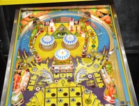 Image # 62281: Mystic Early Production Upper Playfield 
(The center blue drop target is not original to this game. We do not know why the lower pop bumper cap art is a different style. Serial number EMY 1003.)