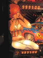 Image # 37008: Nitro Ground Shaker Illuminated Backglass - Detail 
(This game has a plastic composite playfield.)