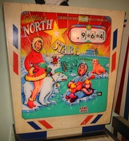 Image # 52589: North Star Sample Game - Plexiglas Backglass 
(The gold stars between the score reels are stickers added by the game owner. Serial number 01046 S.)