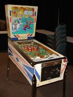 Image # 48727: North Star Sample Game - Cabinet - Left 
(The two passive bumpers at the very top of the playfield have blue skirts. Their caps should also be blue. The backglass has red fade. Cabinet has partial serial number ending with '076 S'.)