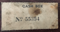 Image # 76014: Olympics Cash Box - Serial Number 
(This tag was found laying unattached inside the cash box.)