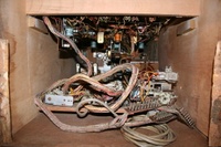 Image # 56359: OXO Inside Cabinet 
(The back of the cabinet has been removed. The coin door lock can be seen at the far end of this view.)