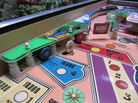 Image # 59473: Party Playfield - Detail 
(The white target is a drop target.)