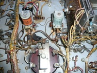 Image # 42743: Planets After-Factory Pop Bumpers 
(This view shows the two pop bumpers and wiring that were added after the game left the factory. From the game with numbers 99609 and 99611.)