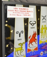 Image # 69186: Planets Backglass - Detail 
(Lou Valenti was a long-time operator on Staten Island, New York. From the game with cabinet serial number 99612.)